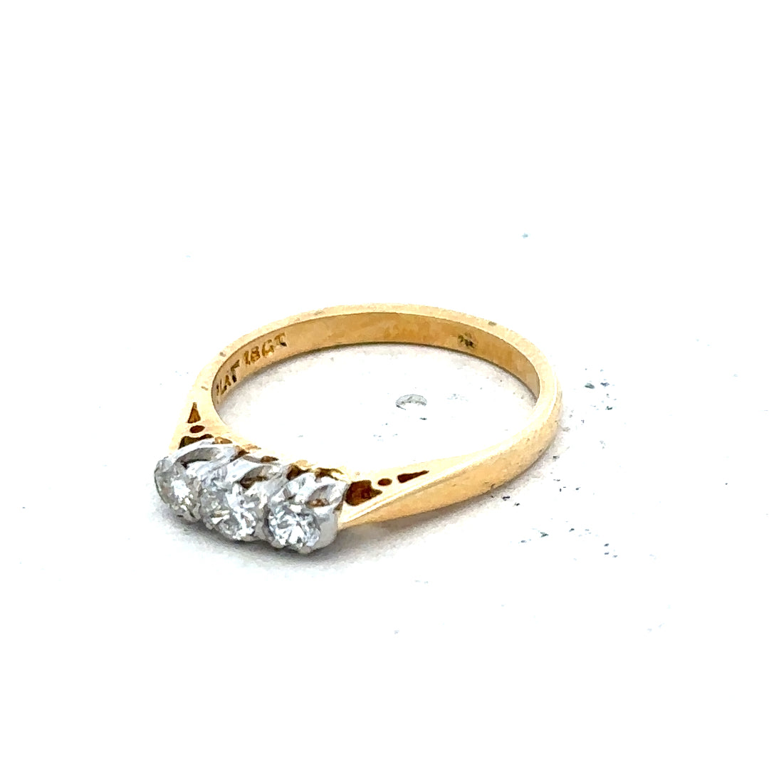 18ct yellow gold diamond ring in size J, featuring sparkling diamonds and a sleek band, weighing 2.5 grams.