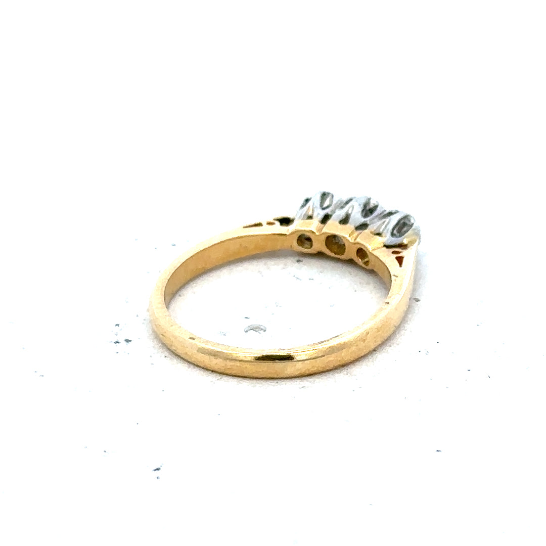 18ct yellow gold diamond ring in size J with a delicate design, weighing 2.5 grams. Unbranded jewelry, elegant and sparkling.