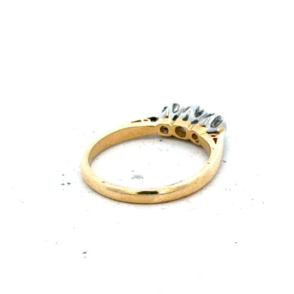 18ct yellow gold diamond ring in size J with a delicate design, weighing 2.5 grams. Unbranded jewelry, elegant and sparkling.