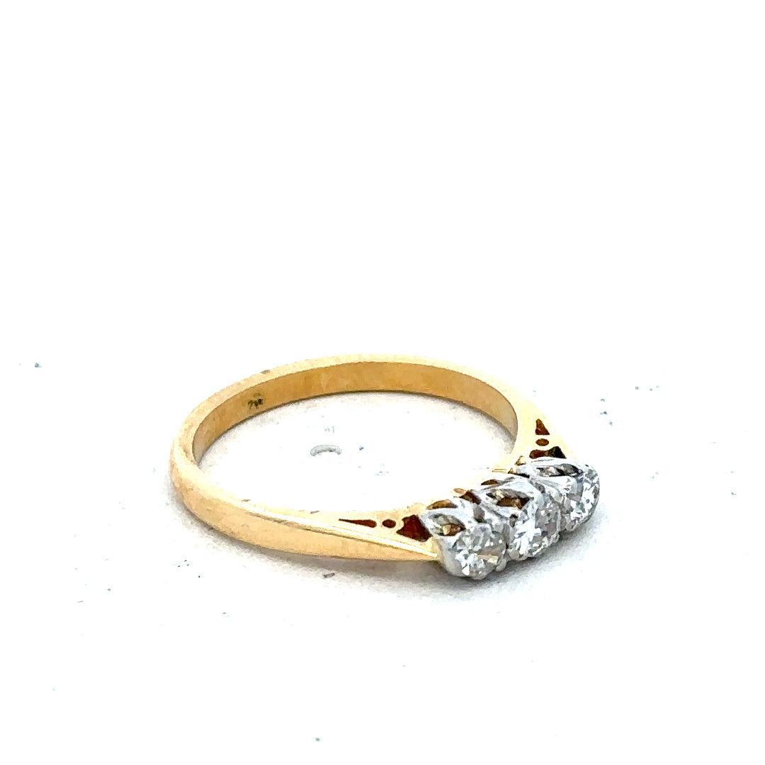 18ct yellow gold diamond ring in size J with a delicate design, weighing 2.5 grams, featuring sparkling diamonds.