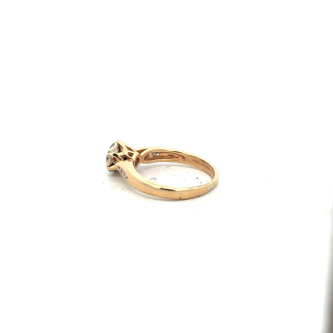 18ct yellow gold diamond ring in size J with sparkling diamonds, unbranded jewelry accessory.
