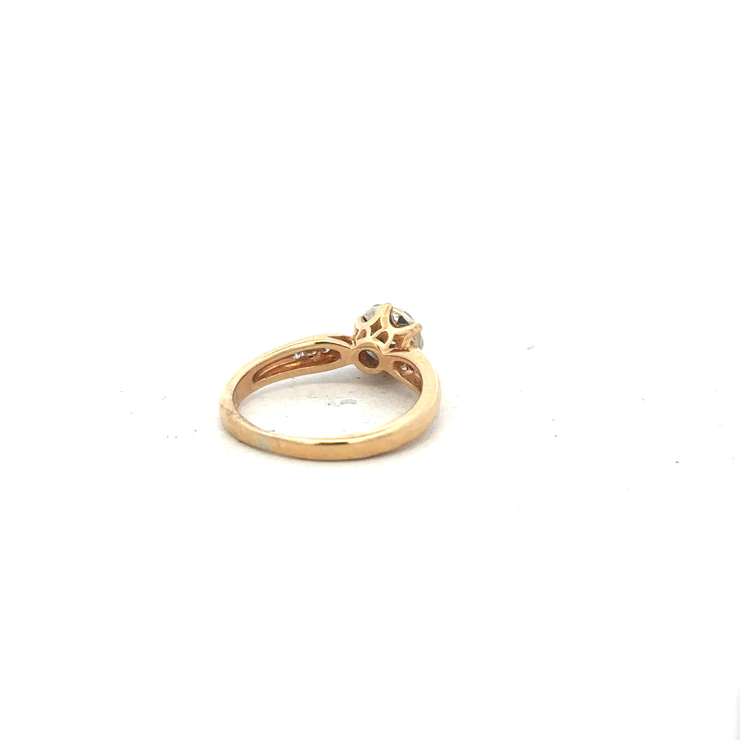 18ct yellow gold diamond ring size J, unbranded, featuring a sparkling diamond centerpiece and elegant band design.