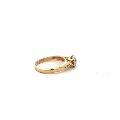 18ct yellow gold diamond ring, size J, featuring a sparkling diamond setting, unbranded jewelry piece.