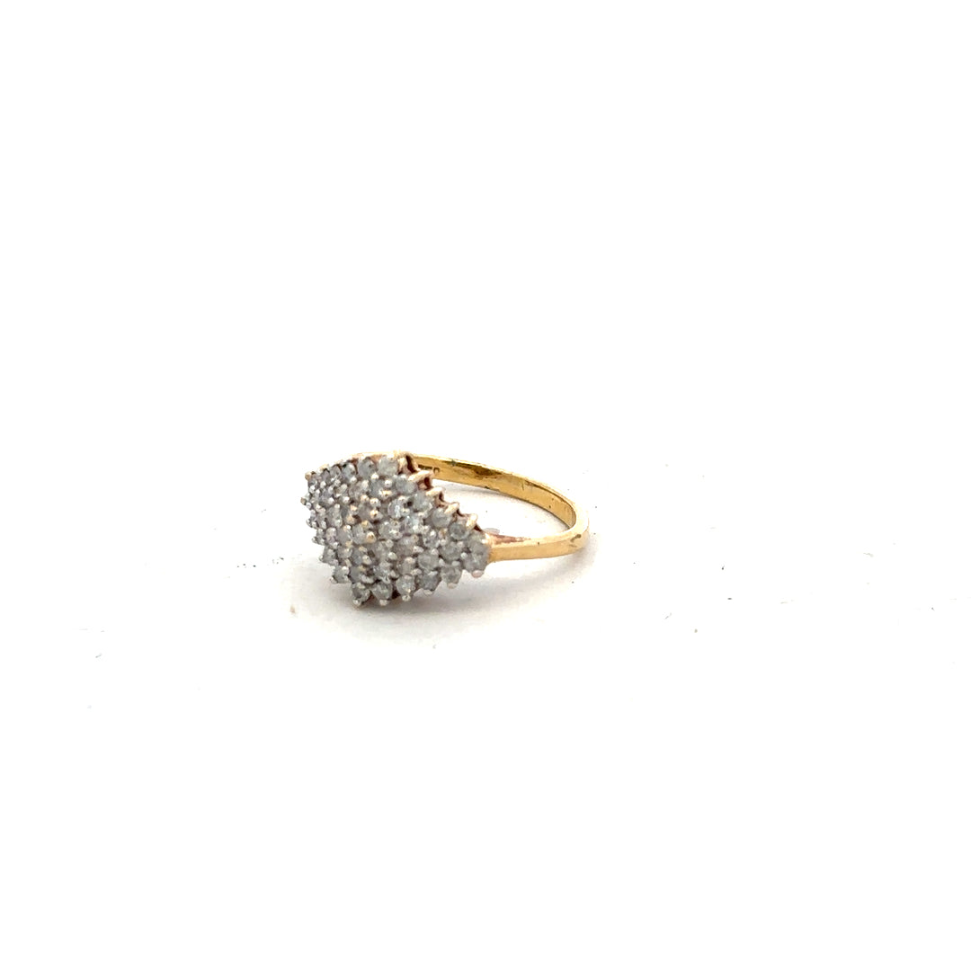 18ct yellow gold diamond ring in size J with sparkling diamonds, unbranded, showcasing a elegant and classic jewelry design.