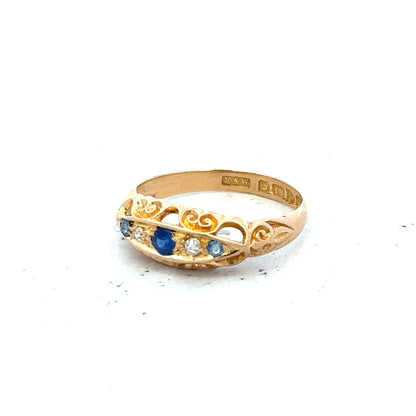 18ct yellow gold diamond ring in size J, featuring a sparkling central diamond and elegant band design.