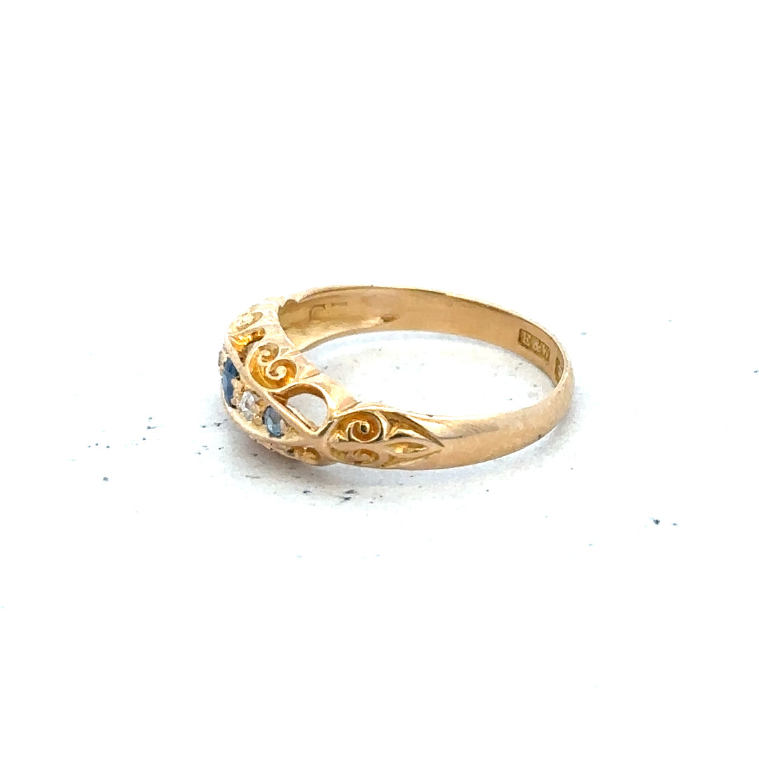 18ct yellow gold diamond ring in size J with sparkling diamonds, featuring a sleek, elegant design.