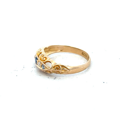 18ct yellow gold diamond ring in size J with sparkling diamonds, featuring a sleek, elegant design.