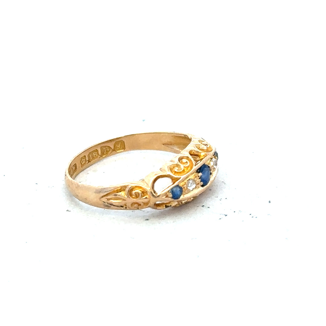 18ct yellow gold diamond ring in size J, featuring a sparkling diamond centerpiece and elegant band design.
