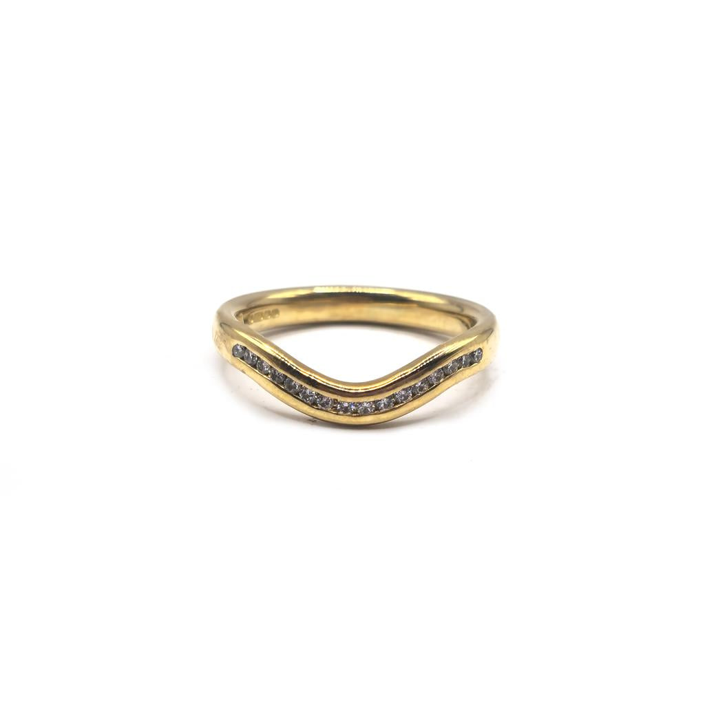 18ct yellow gold diamond ring in size K, featuring a sparkling diamond set in a simple, elegant band.