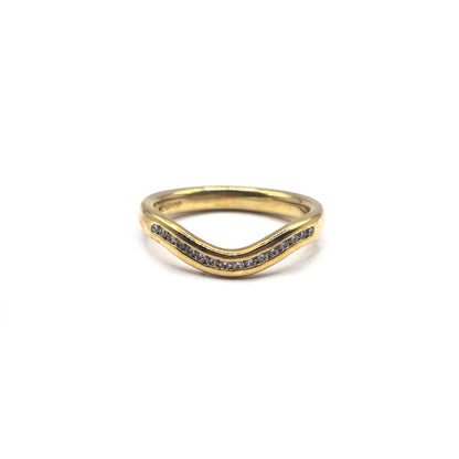 18ct yellow gold diamond ring in size K, featuring a sparkling diamond set in a simple, elegant band.