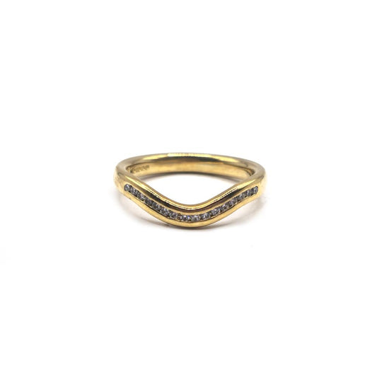 18ct yellow gold diamond ring in size K, featuring a sparkling diamond set in a simple, elegant band.