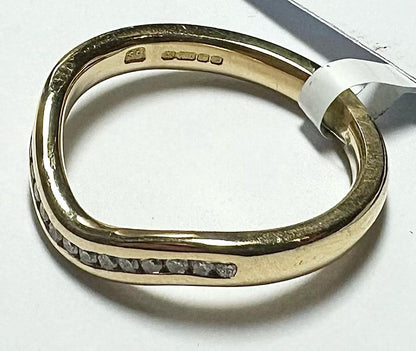 18ct yellow gold diamond ring in size K with a sparkling diamond setting, unbranded jewelry piece.