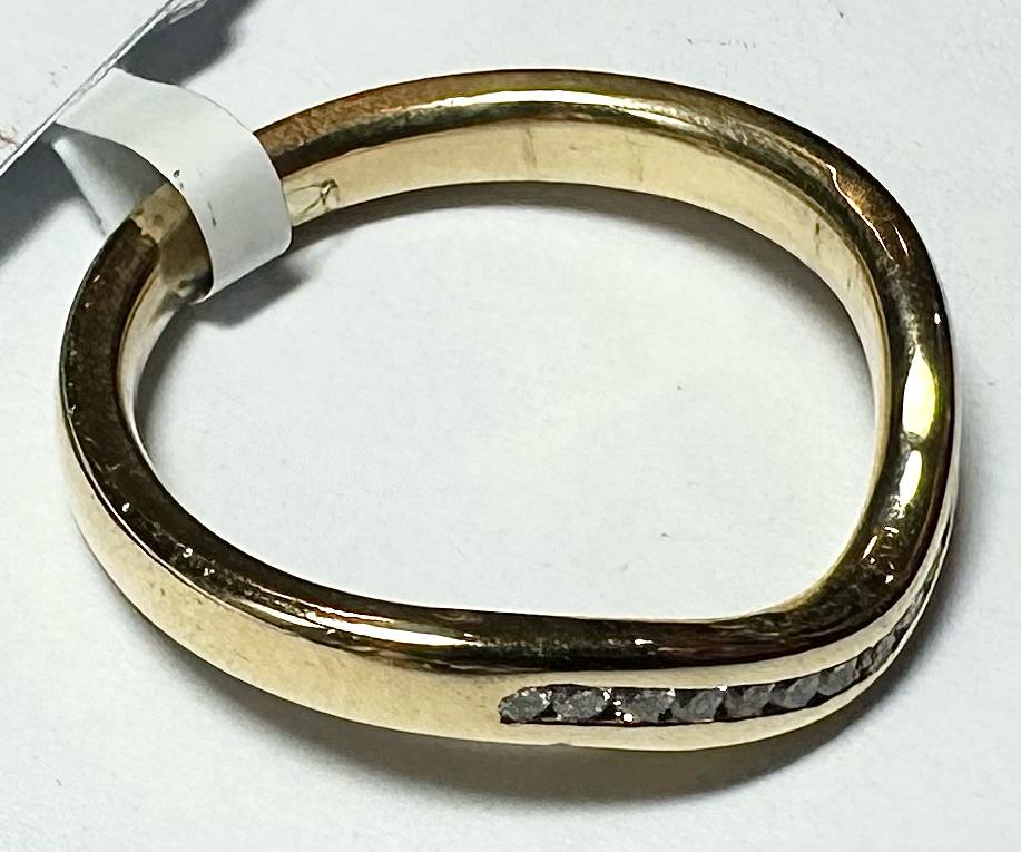 18ct yellow gold diamond ring in size K with sparkling diamonds, unbranded jewelry piece.