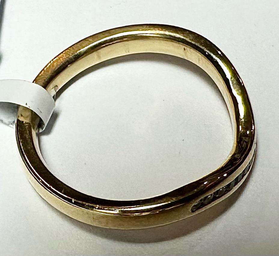 18ct yellow gold diamond ring in size K with sparkling diamonds, unbranded jewelry piece with elegant design.