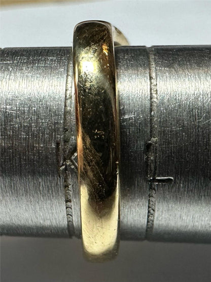 18ct yellow gold diamond ring, size K, featuring a sparkling diamond centerpiece with a polished band.