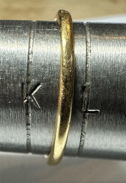 18ct yellow gold diamond ring in size K1/2, showcasing a sparkling diamond set on a sleek gold band.