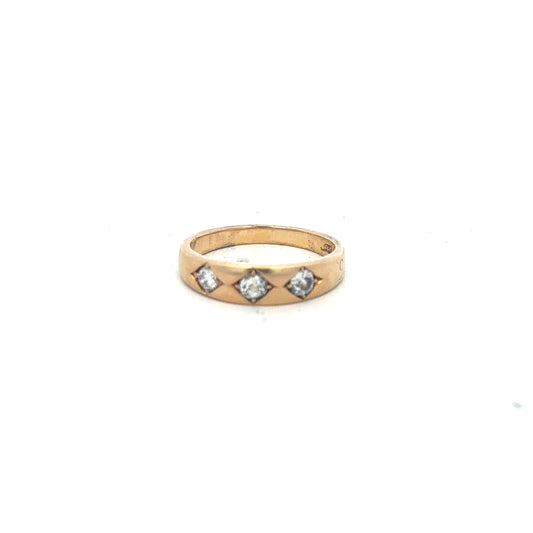 18ct yellow gold diamond ring in size K1/2, featuring a sparkling diamond setting and a classic band design.