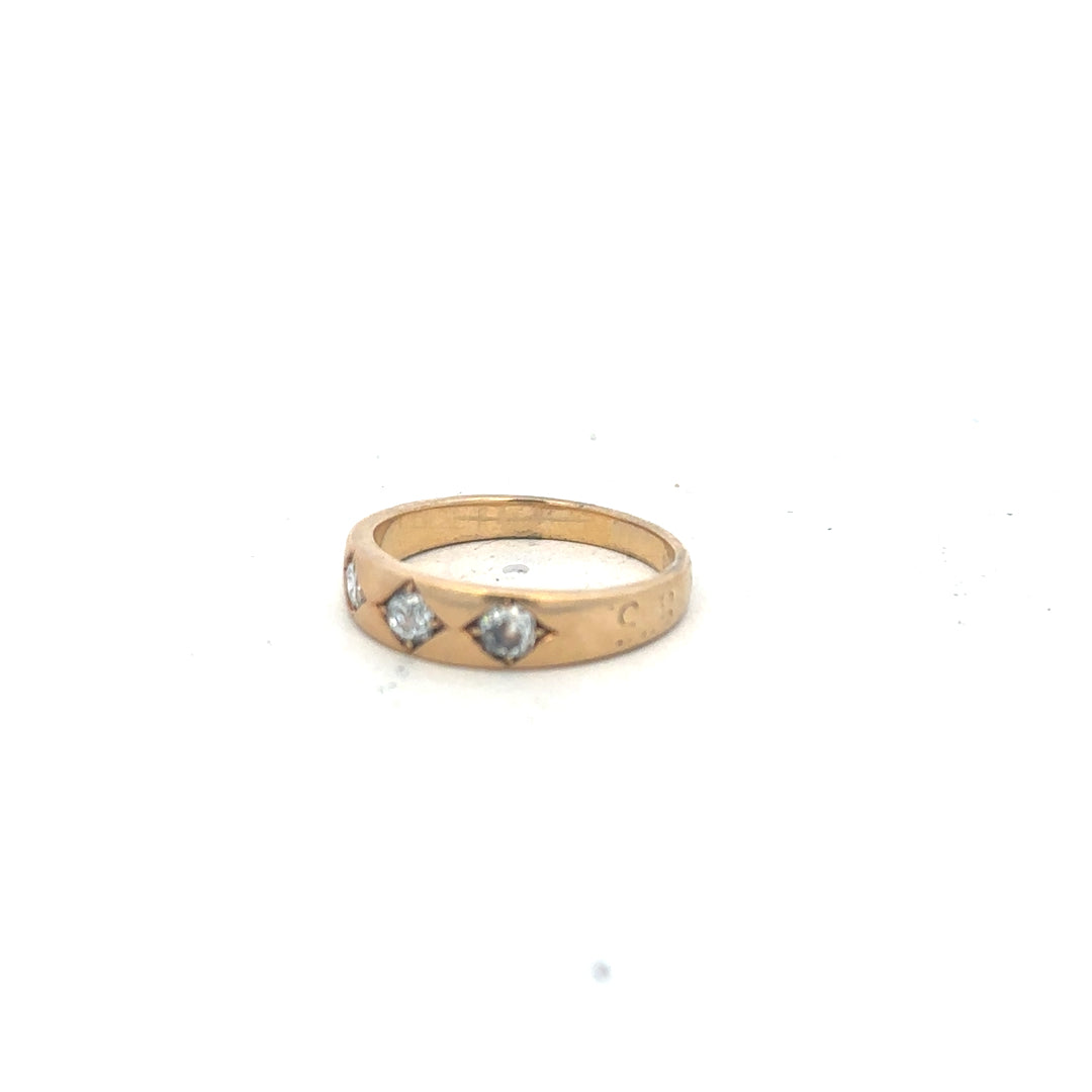 18ct yellow gold diamond ring in size K1/2, featuring sparkling diamonds and a classic design.