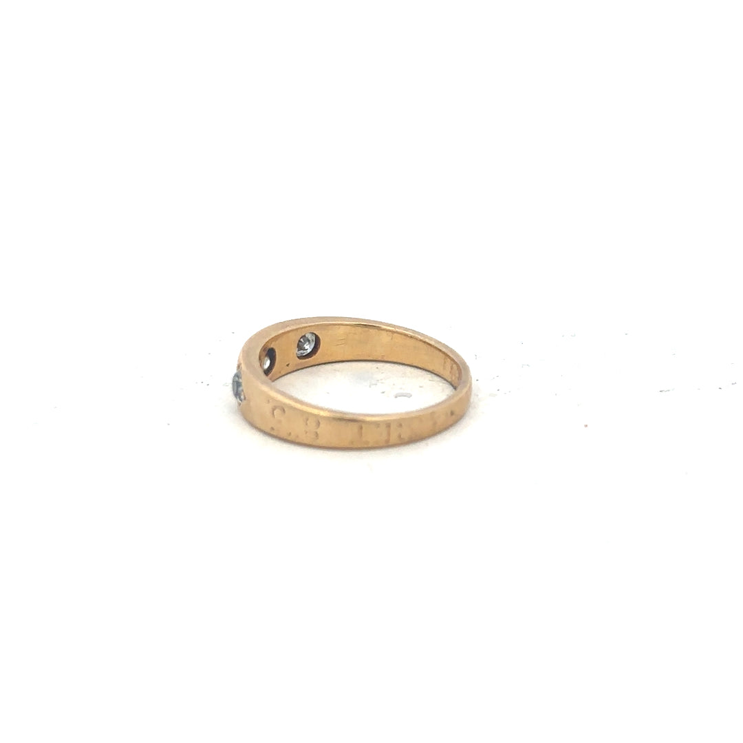 18ct yellow gold diamond ring size K1/2 with sparkling diamonds, showcasing elegant jewelry design.
