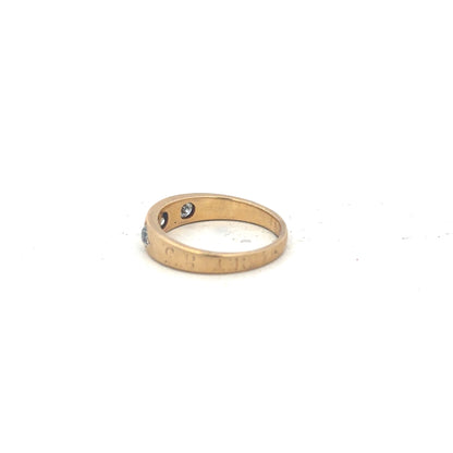 18ct yellow gold diamond ring size K1/2 with sparkling diamonds, showcasing elegant jewelry design.