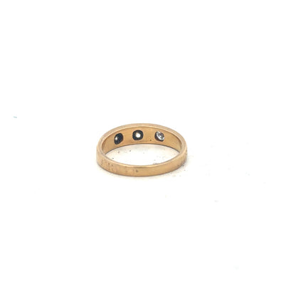 18ct yellow gold diamond ring in size K1/2, featuring a sparkling diamond setting and a sleek, elegant band.