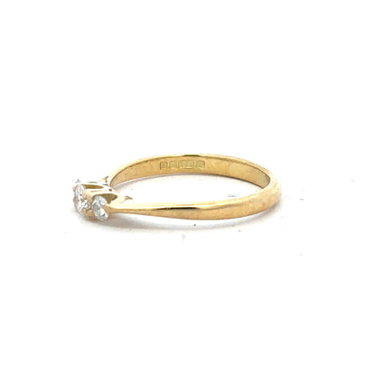 18ct yellow gold diamond ring, size L, featuring sparkling diamonds and a sleek band design, unbranded jewelry accessory.