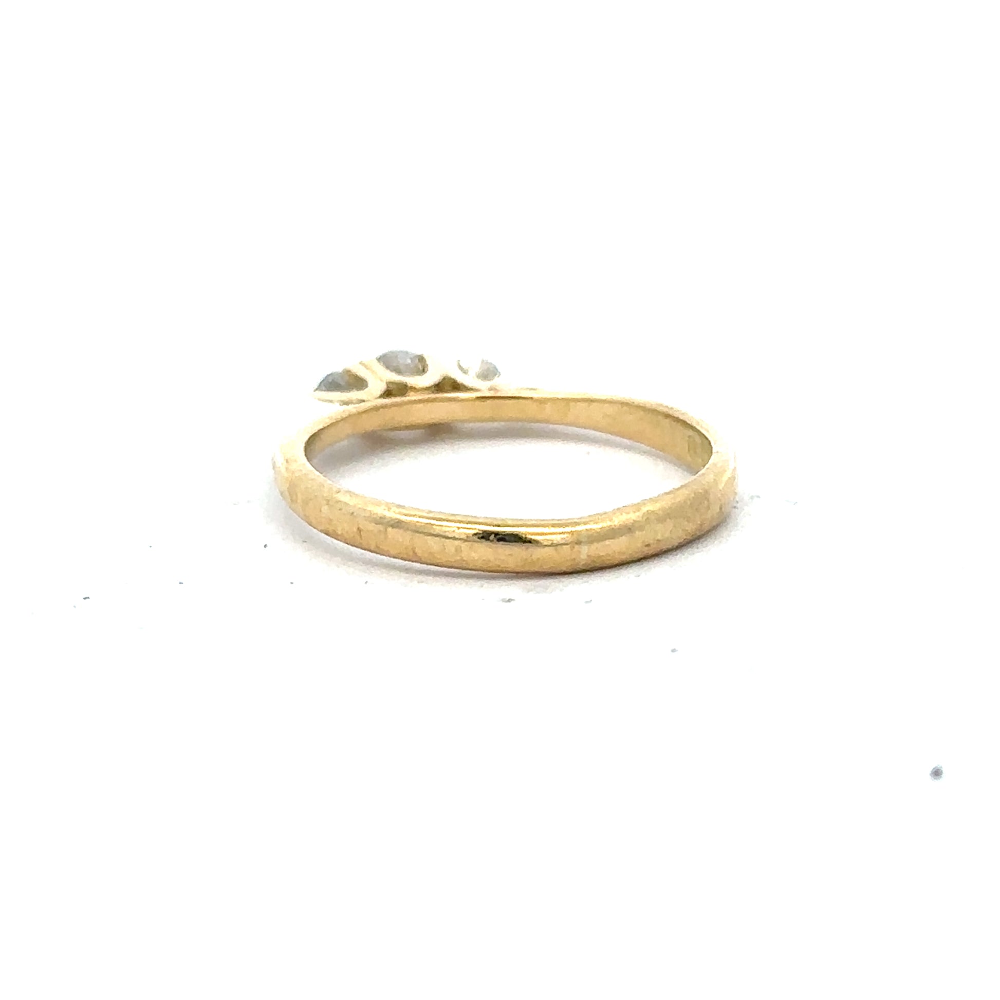 18ct yellow gold diamond ring in size L, featuring a sparkling diamond setting and a sleek, elegant band.