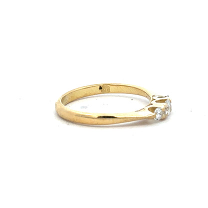 18ct yellow gold diamond ring in size L, featuring a sparkling diamond setting, unbranded jewelry accessory.