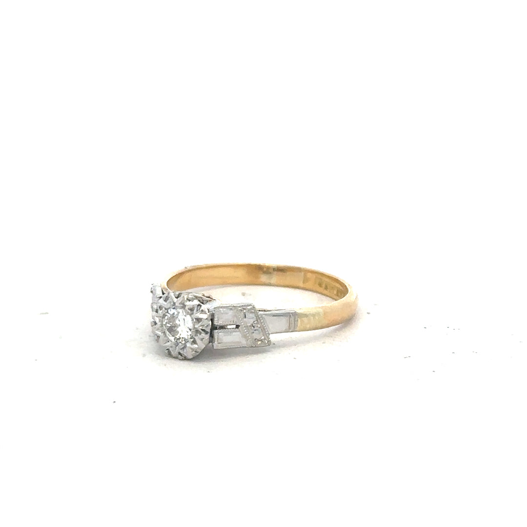 18ct yellow gold diamond ring in size L, featuring a sparkling diamond gemstone and a classic band design.
