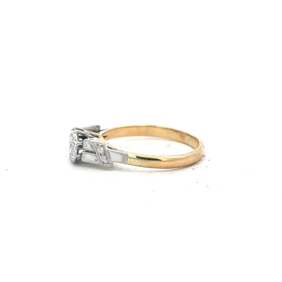 18ct yellow gold diamond ring with a sparkling central diamond, size L, unbranded jewelry piece.