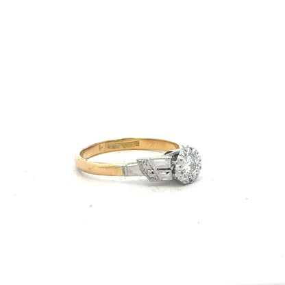 18ct yellow gold diamond ring in size L, featuring a sparkling diamond setting and a sleek band design.