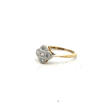 18ct yellow gold diamond ring in size L, featuring sparkling diamonds and a sleek band design.