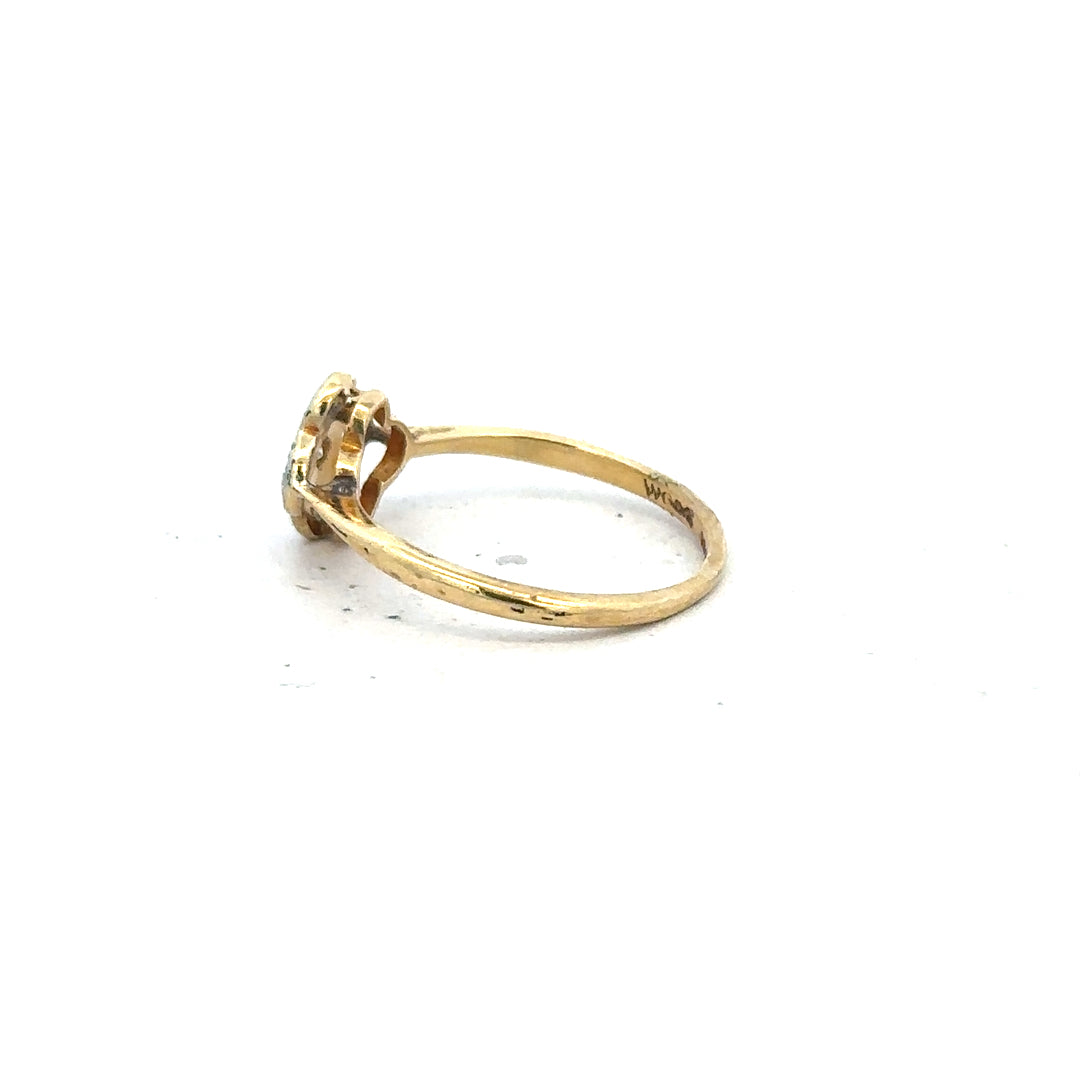 18ct yellow gold diamond ring in size L with sparkling diamonds, unbranded jewelry piece displayed on a plain background.