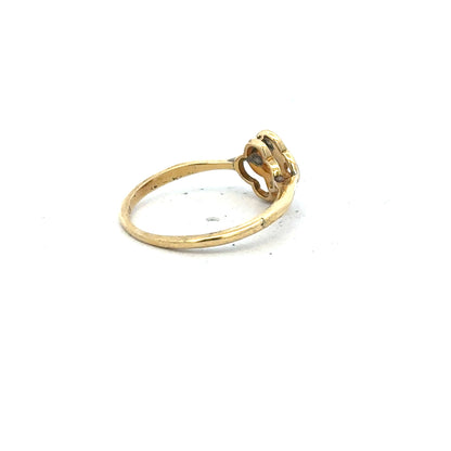 18ct yellow gold diamond ring in size L featuring a sparkling diamond, unbranded jewelry piece with elegant design.
