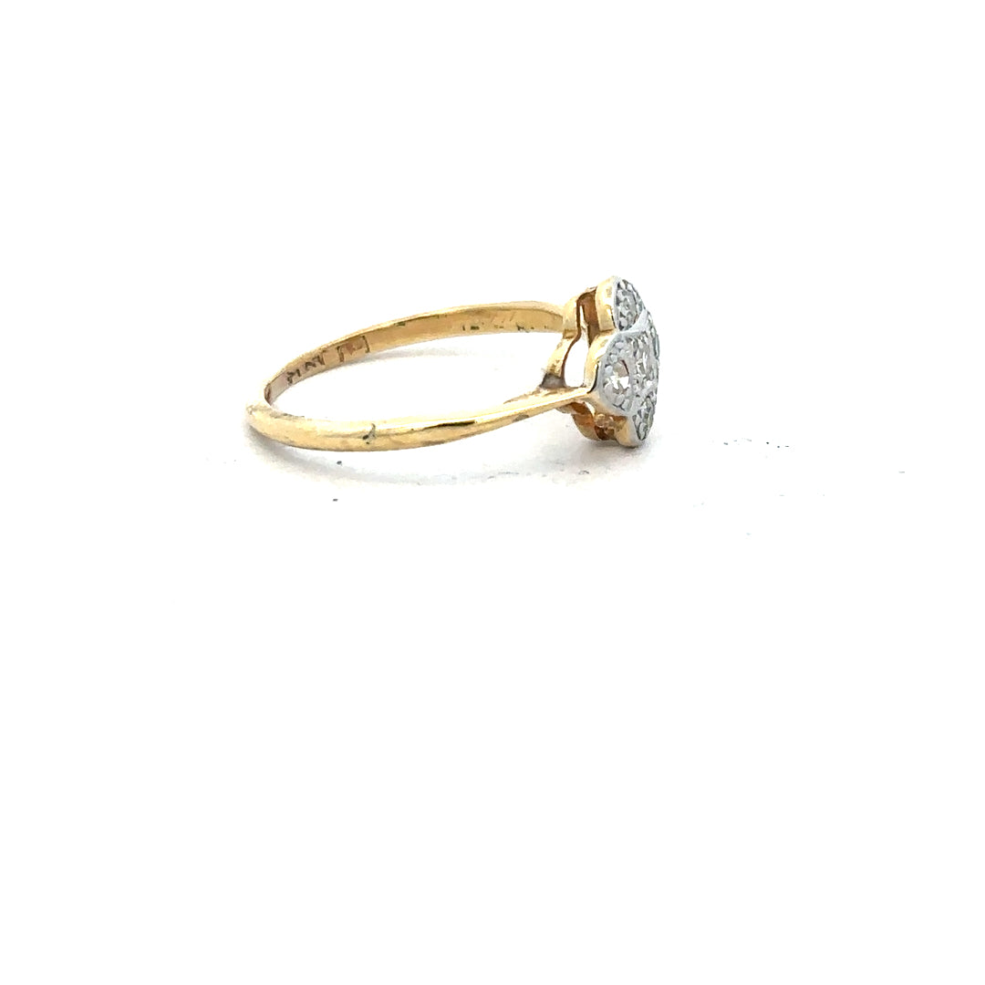 18ct yellow gold diamond ring in size L with sparkling diamonds, showcasing elegant craftsmanship and a classic design.