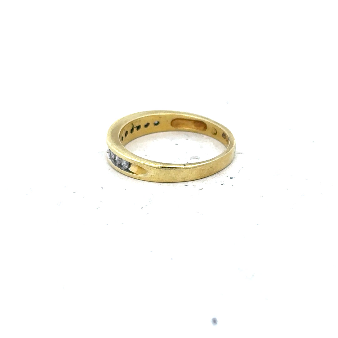 18ct yellow gold diamond ring in size L with sparkling diamonds, unbranded jewelry piece with elegant design.