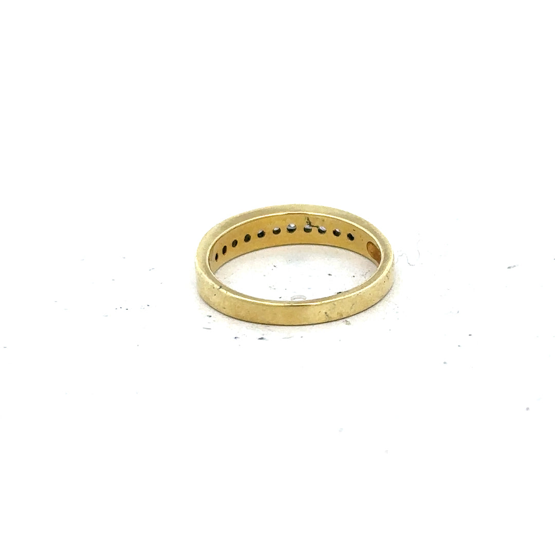 18ct yellow gold diamond ring in size L with sparkling diamonds, unbranded jewelry piece with elegant design.