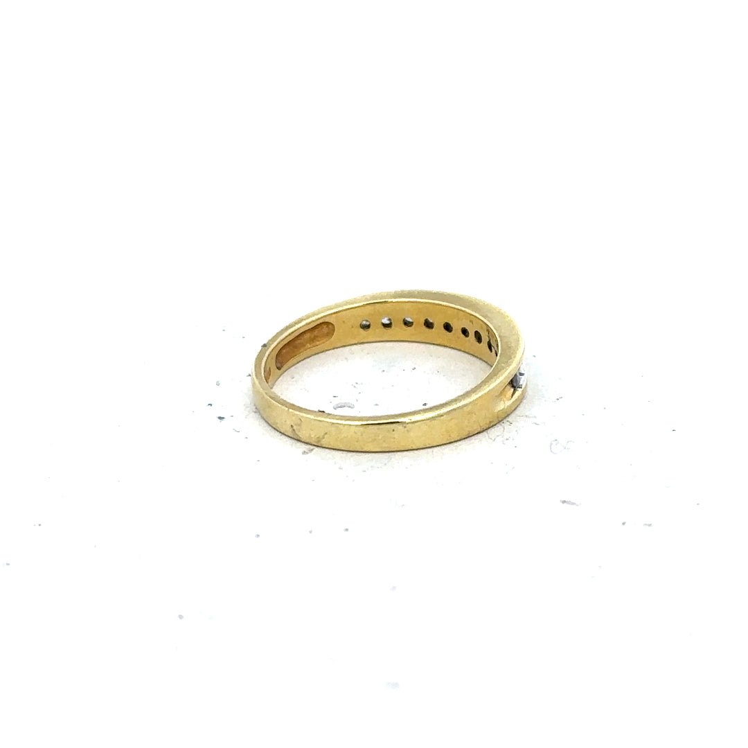18ct yellow gold diamond ring in size L featuring a sparkling diamond set design, unbranded jewelry piece.