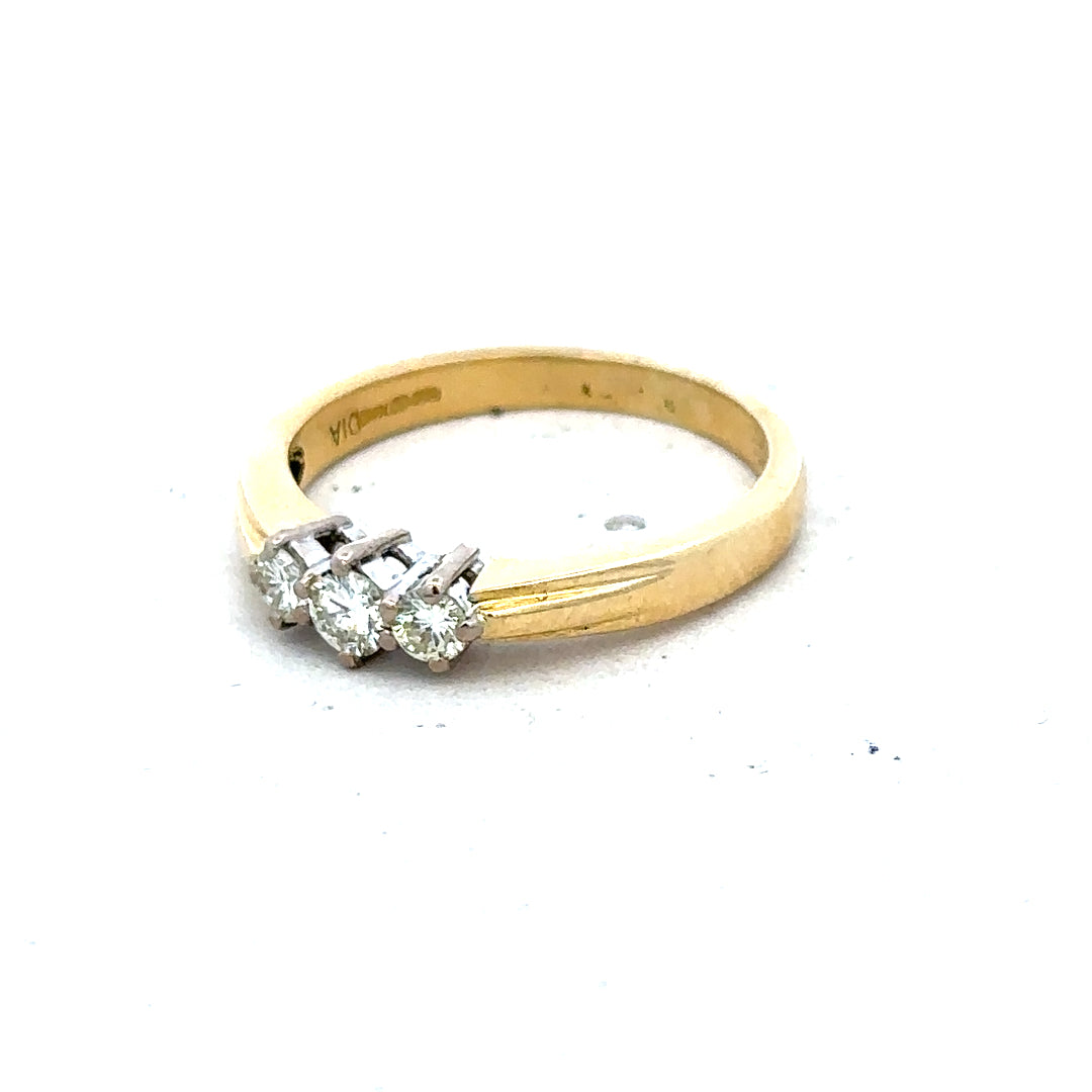 18ct yellow gold diamond ring in size L1/2, featuring a sparkling diamond accent on a sleek band.
