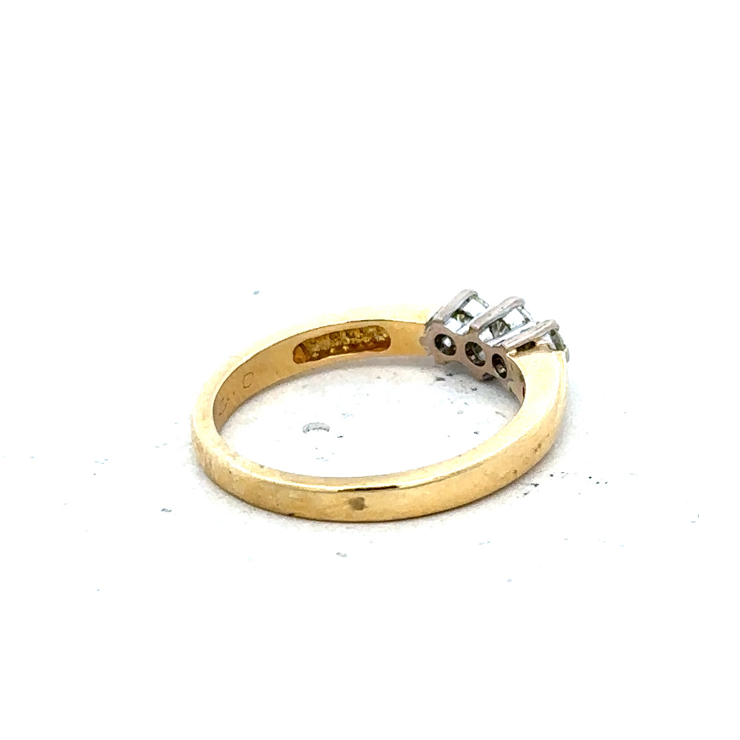 18ct yellow gold diamond ring, size L1/2, featuring sparkling diamonds on a classic band.