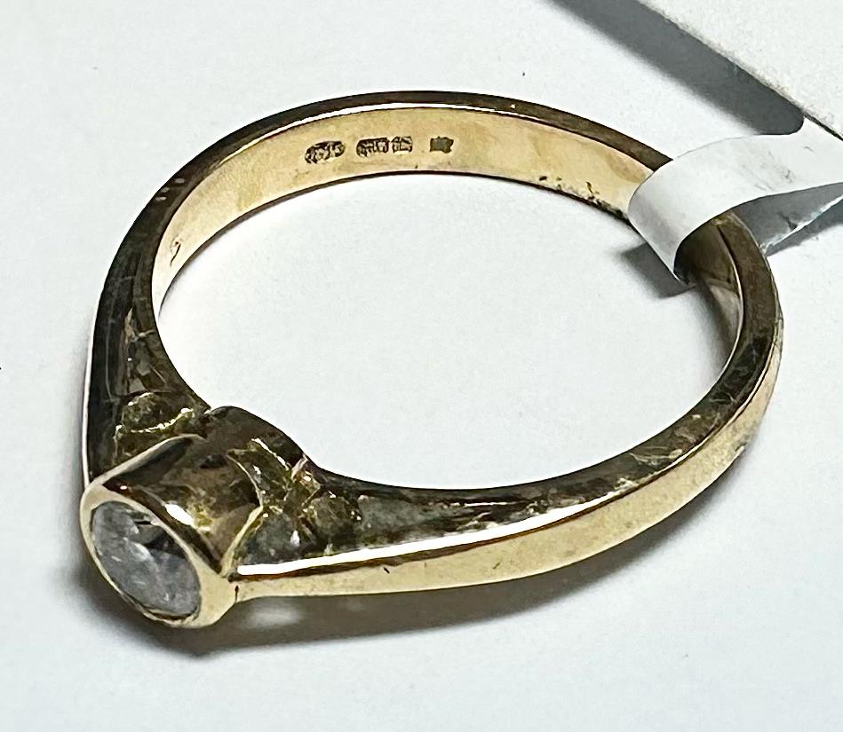 18ct yellow gold diamond ring in size L 1/2, featuring a sparkling diamond setting and elegant design.
