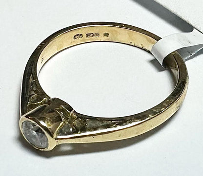 18ct yellow gold diamond ring in size L 1/2, featuring a sparkling diamond setting and elegant design.