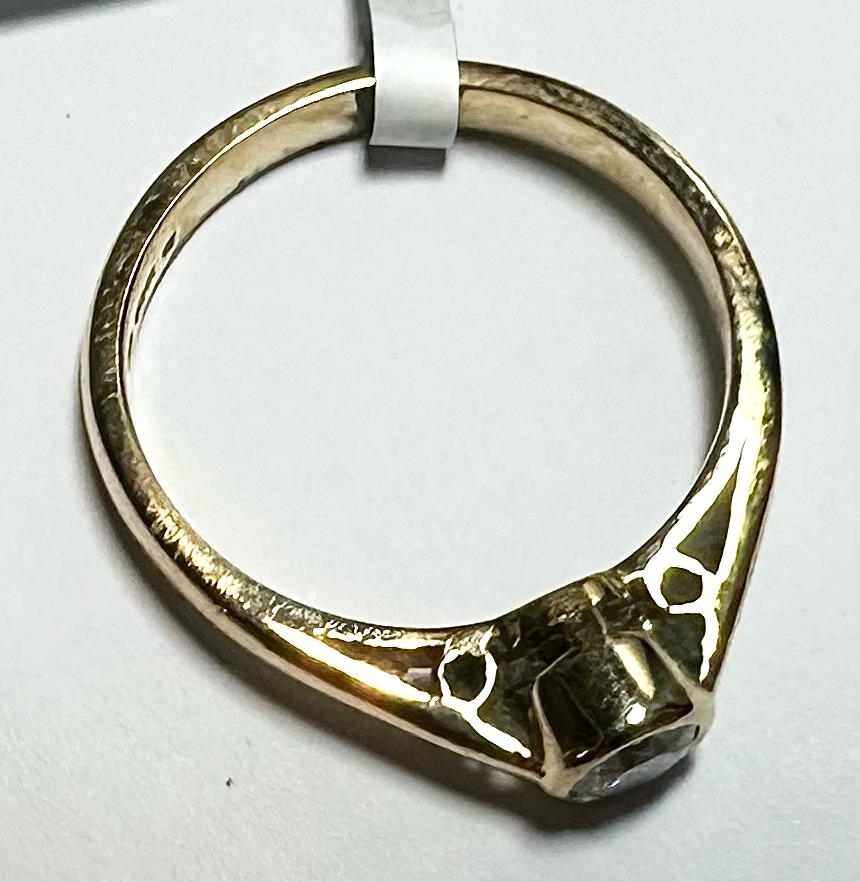 18ct yellow gold diamond ring in size L1/2, featuring a sparkling diamond set in a sleek, elegant band.