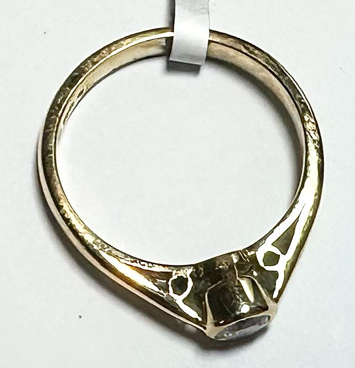 18ct yellow gold diamond ring in size L 1/2, featuring a sparkling diamond setting, unbranded jewelry accessory.
