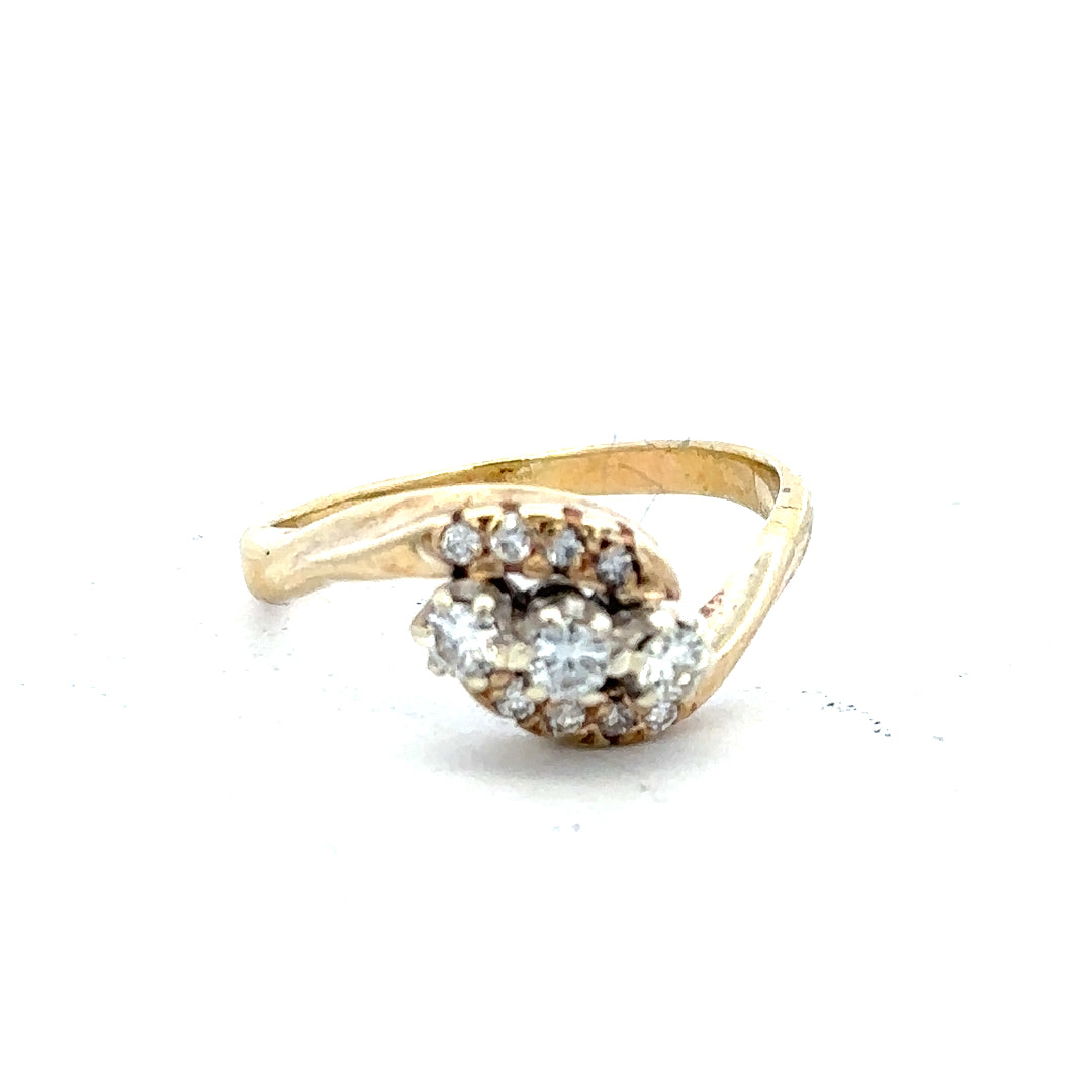 18ct yellow gold diamond ring in size M with sparkling diamonds, showcasing elegant and timeless jewelry design.