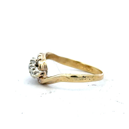 18ct yellow gold diamond ring, size M, featuring a sparkling diamond setting and an elegant band design.