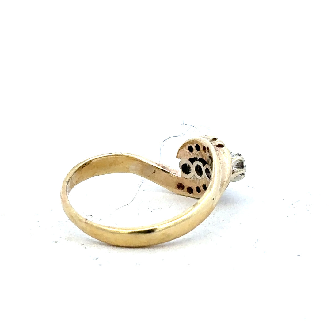 18ct yellow gold diamond ring in size M, featuring a sparkling diamond setting on a sleek band.