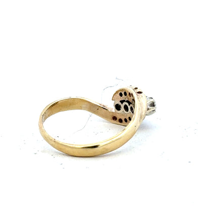 18ct yellow gold diamond ring in size M, featuring a sparkling diamond setting on a sleek band.