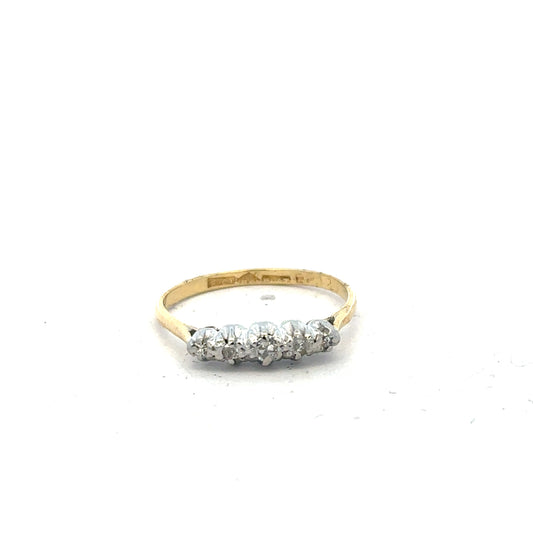 18ct yellow gold diamond ring in size N featuring a sparkling central diamond and intricate band design.
