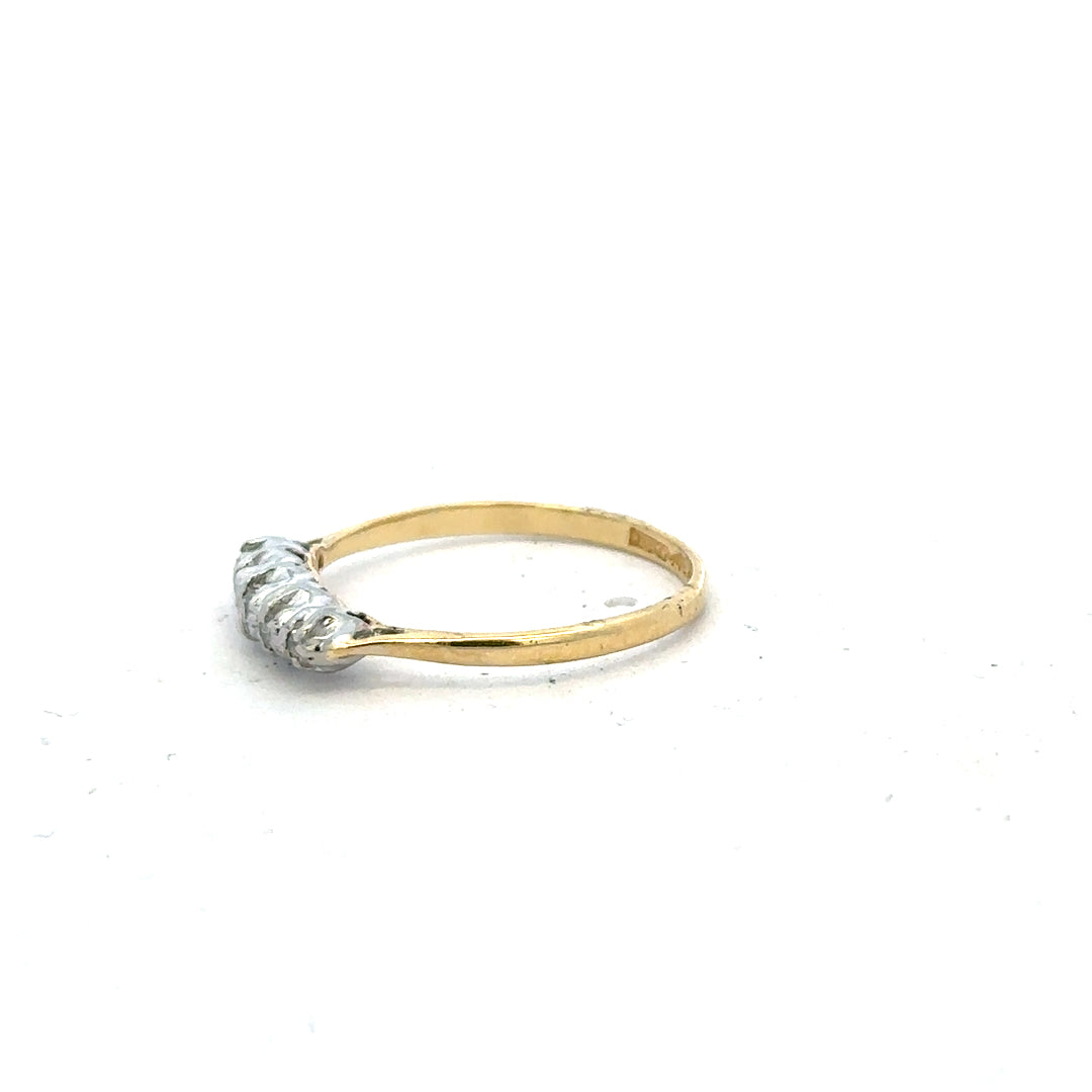18ct yellow gold diamond ring in size N with sparkling diamonds, unbranded jewelry piece on a plain background.
